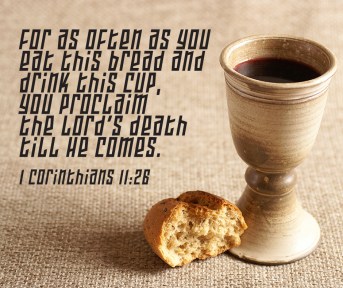 Chalice with wine and bread. Background with copy space