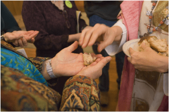 hands-and-bread-closea